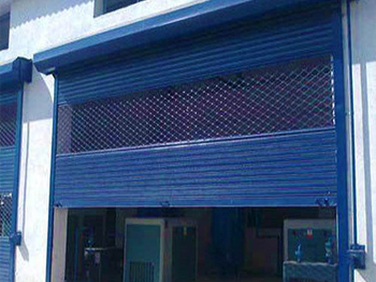Shutter combining solid laths below with a grill section above